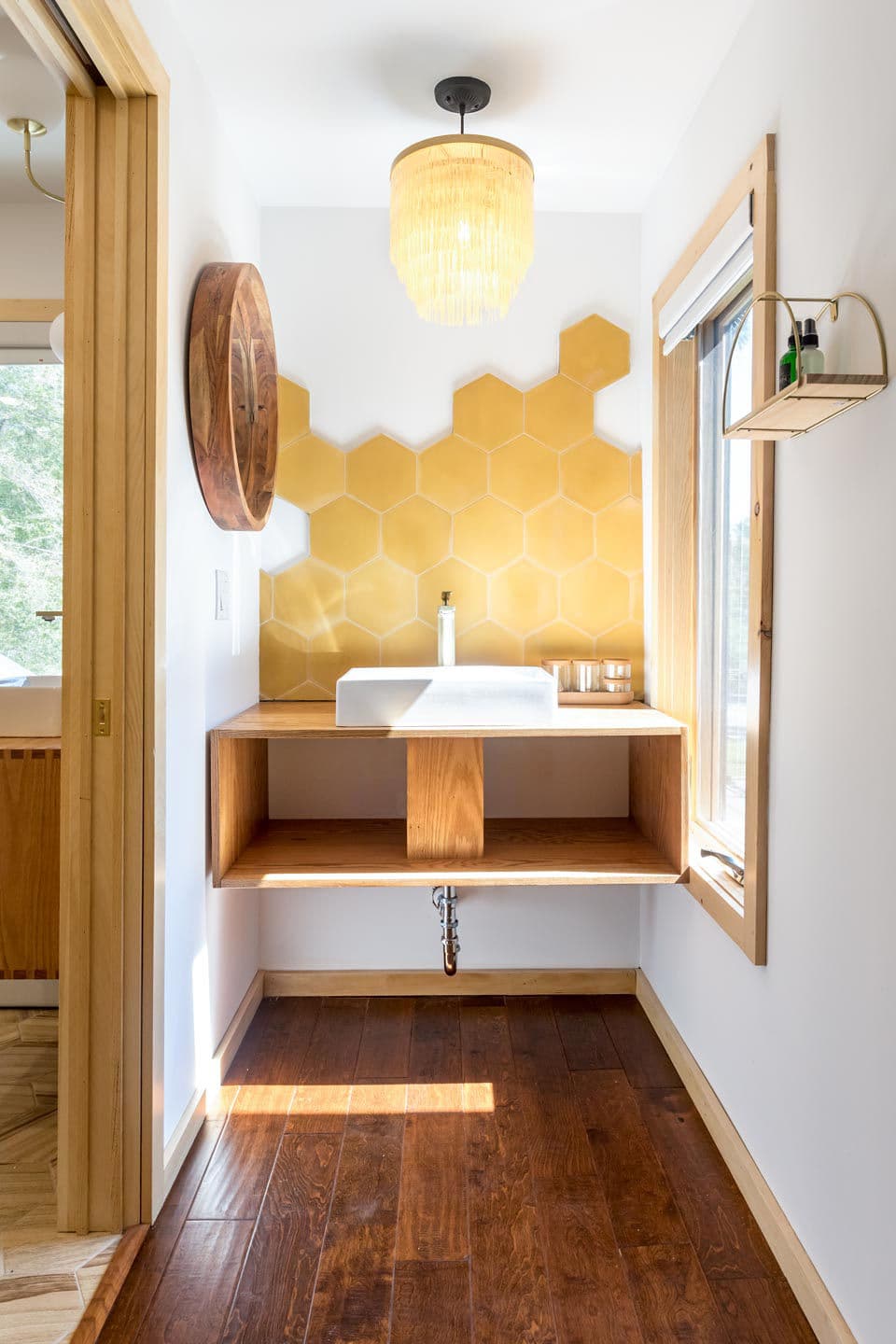 Boutique hotel bathroom with hexagonal tiles
